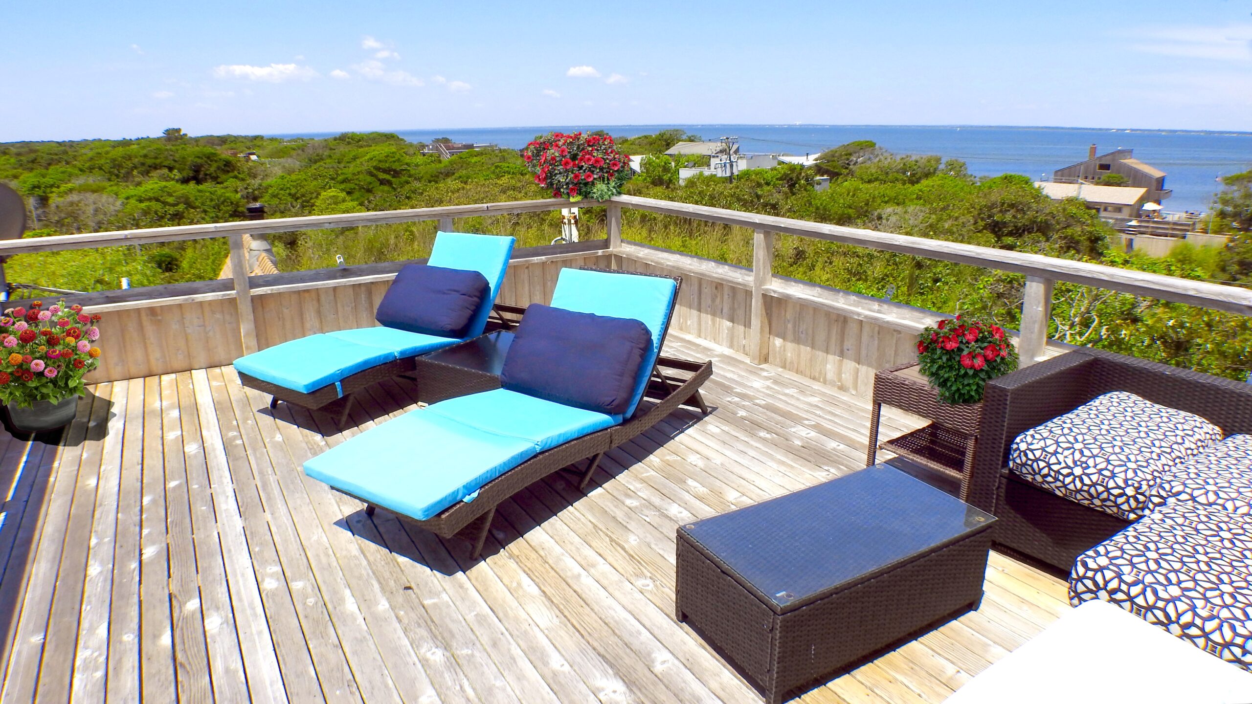 Lounge chairs on a deck high above our home lends sweeping 360 Degree Panoramic Views of the Great South Bay View and the Fire Island Pines